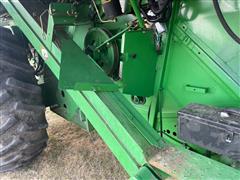 items/04a2575819da476a9a933f83b9f8e22e/1995johndeere9500combine-24_076565acbd3f4eae93baa7cdce0e01d9.jpg