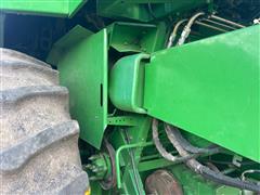 items/04a2575819da476a9a933f83b9f8e22e/1995johndeere9500combine-24_9acce9903cf24083bb96b5c56a1deacf.jpg