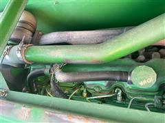 items/04a2575819da476a9a933f83b9f8e22e/1995johndeere9500combine-24_b8b02aed30b247808872b69391e73fa2.jpg