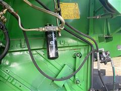 items/04a2575819da476a9a933f83b9f8e22e/1995johndeere9500combine-24_dc1f04b057eb4e7d903234ffd87dd19e.jpg