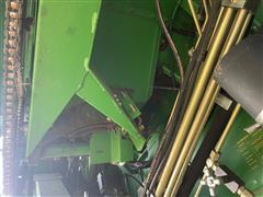 items/04a2575819da476a9a933f83b9f8e22e/1995johndeere9500combine-24_f02ecc0e3db648289faaf78f1ecdf0c1.jpg