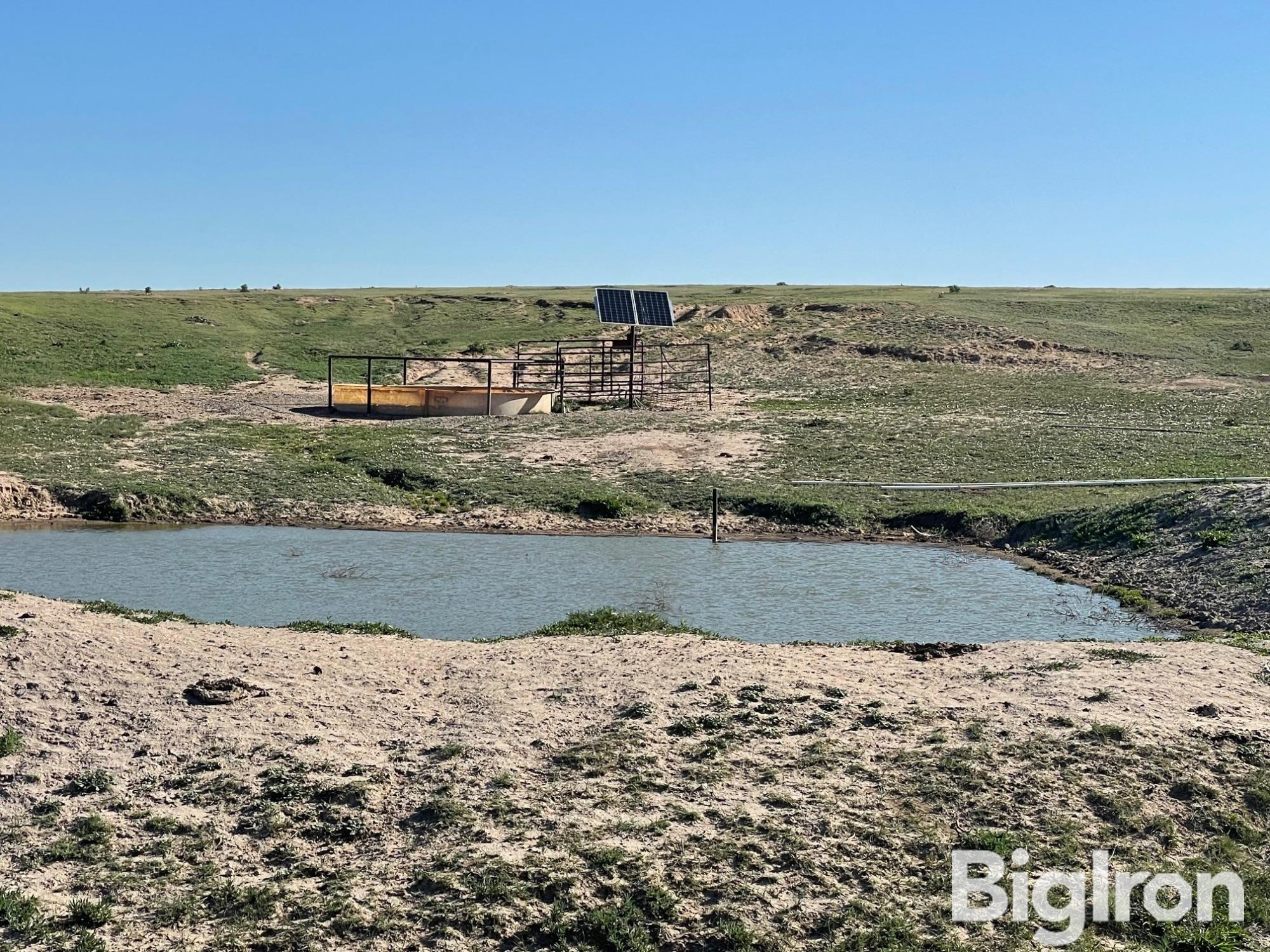 Solar pump tank pond.jpg