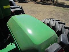 items/077f463fe1d4ed11a81c6045bd4cc723/1998johndeere91004wdtractor-4_13471bc1a0874d86995538c82ddef948.jpg