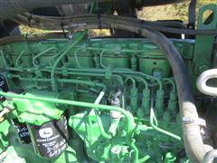 items/077f463fe1d4ed11a81c6045bd4cc723/1998johndeere91004wdtractor-4_54b2ee64d39a4b7684873afe715a930a.jpg