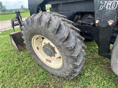 items/17d18f2ce132ee11a81c0022488cca71/1998newholland8260mfwdtractorwloader_ac9e167123844fa584907cfec3cf4eec.jpg