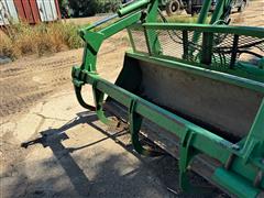 items/1981bec99f69ef11a4e6000d3a62e002/johndeere641loaderwgrapple_2e07ee1920494345a8517b6bc166ac36.jpg