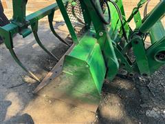 items/1981bec99f69ef11a4e6000d3a62e002/johndeere641loaderwgrapple_68ec1f902d114915826d8dc9d60fc392.jpg