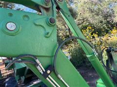 items/1981bec99f69ef11a4e6000d3a62e002/johndeere641loaderwgrapple_6c24ca971b7a4f15960702a6630bbc58.jpg