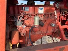 items/1ede3527696aeb118ced00155d42e7e6/newholland1100windrower-3_2b239e83b69f492cb611ade6041b2f03.jpg