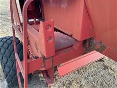 items/1ede3527696aeb118ced00155d42e7e6/newholland1100windrower-3_e15ce0e2c9424a3aaf36c52ddb20c5a0.jpg