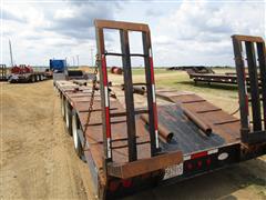 items/215da4302a34ef11a296000d3ad41af2/2013nuttall350lb46tri-axlelowboytrailer_f36355c1ce434e7f883b19e8452f0ef5.jpg