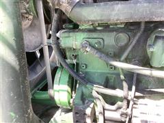 items/21852fd7f651ef11b4ad0022488ff517/1998johndeere6650selfpropelledforageharvester_3ceca005e6cd455cac6ca7ff08f95be4.jpg