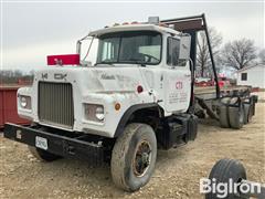 1983 Mack DM686S T/A Roll-Off Truck 