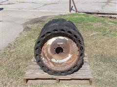 items/31211eba7746ec11a3ee0003fff903d6/noairskidsteertires_56ecd34f374c4baf941b1c6c9d35bccd.jpg