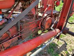 items/3332e172c9dfed11a81c00224890e11c/1961farmall5602wdtractorwfarmhandf11loader_2d5153cacedd4ff4ba92c074a9aa0ae5.jpg