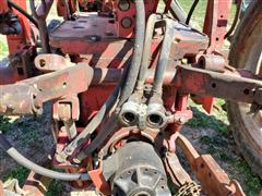 items/3332e172c9dfed11a81c00224890e11c/1961farmall5602wdtractorwfarmhandf11loader_790c7d58965b46889e43796dc6a75643.jpg