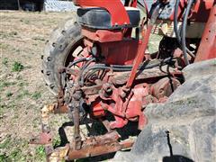 items/3332e172c9dfed11a81c00224890e11c/1961farmall5602wdtractorwfarmhandf11loader_f844f0a6244e49cbadb4df4c46b8ca8f.jpg