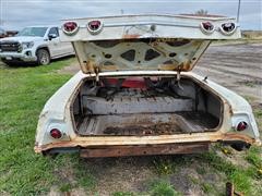 items/38e8556231cfec11bea200155d72f54a/1962chevroletimpala18394doorsportsedancar_1acaaf0eb12545caa95c039846722a30.jpg