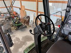 items/4116035aabc6ed11a81c6045bd4cc723/1984johndeere7720combine-9_8056c05cbdce415682013e2998111bda.jpg