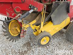 items/4505ec2efae7ef11a4dd6045bd4c6ac5/2003-new-holland-br780-round-baler_1230dee4cb85473f904f514e885dd454.jpg