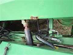 items/4677e4a8db59ef11a4e6000d3a62e002/1999johndeere74554r30cottonstripper_d06010f917ee40318908e115f6ceb57a.jpg