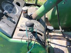 items/467d32627e40ee11a81c000d3ad3feaa/1964johndeere40202wdtractorwithloader_23368f58bd92493aacc1fba63b38bd5e.jpg