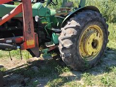 items/467d32627e40ee11a81c000d3ad3feaa/1964johndeere40202wdtractorwithloader_93ee9ec15654456f81d2325ffc6d2312.jpg