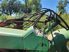 items/467d32627e40ee11a81c000d3ad3feaa/1964johndeere40202wdtractorwithloader_bcf78549fe1c46a8b14db2d1c9390502.jpg