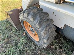 items/478d7f1e1f88ee11a81c6045bd4a636e/1997bobcat763skidsteer_505fbb39409e4705891fa66e8f772333.jpg