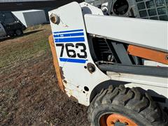 items/478d7f1e1f88ee11a81c6045bd4a636e/1997bobcat763skidsteer_7337c339f96d413ba7445ea4e1003df3.jpg