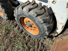 items/478d7f1e1f88ee11a81c6045bd4a636e/1997bobcat763skidsteer_e82c90bbc784436ca6c030549d459395.jpg