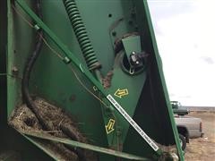 items/47f36e4da42aeb118fed00155d72eb61/johndeere568megawideplusroundbaler-12_0c78a63e9f674629801604e46fd00180.jpg