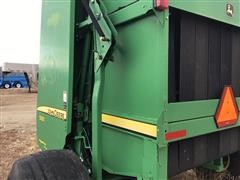 items/47f36e4da42aeb118fed00155d72eb61/johndeere568megawideplusroundbaler-12_106d22dd91034dc981c35a7ac97f2280.jpg