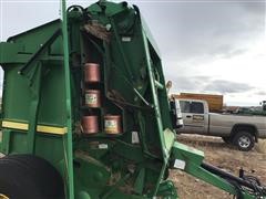 items/47f36e4da42aeb118fed00155d72eb61/johndeere568megawideplusroundbaler-12_1976292b734244cfb99999fb27eada7f.jpg