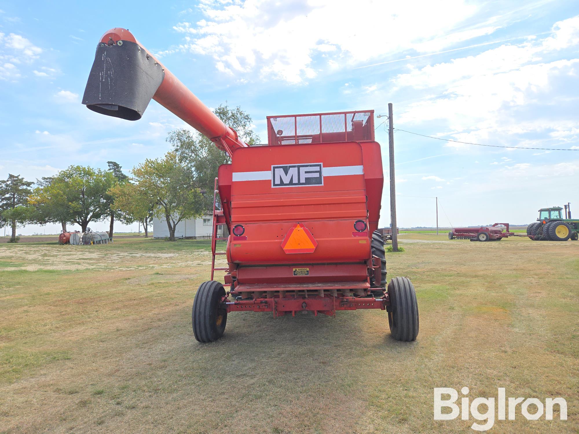 items/48241c215c89ef1194430022488d1829/1979masseyferguson750combine_76476cc237c24e36a42bfa4f1e478fe1.jpg