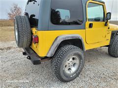 items/4bd50366ee8fee1192bc0022488ff517/2001jeepwranglersport2door_a68757da59e74e21b5c5a83400ac589d.jpg