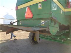 items/4ed22ccd9dc6411b8de0b1bbd565545b/1991johndeere9500combine-14_a5c49e0953dc4ce797fb847ed309be07.jpg