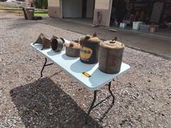 Old Oil Containers And Funnels 