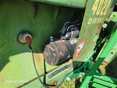 items/535d2fe71a40ee11a81c00224890d91b/1970johndeere40202wdtractor-24_db605140ecb54c8eab0dfc7fd0575209.jpg