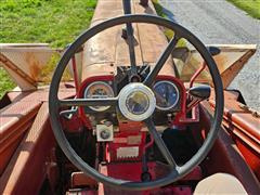 items/53f3034e0a4cee11a81c000d3a618ce0/1966farmall7062wdtractorwih234cornpicker_d85a9ec6a2554dea857b529267871245.jpg