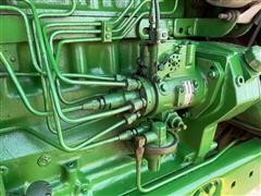 items/5e70060af8a1488687441a260499ee7b/1978johndeere40402wdtractor-5_0e3d7da4f16749d7a23c549afb085233.jpg