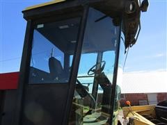 items/5e937966d1aeeb1189ee00155d424509/newholland2550selfpropelledwindrower-3_37a2af739fe04018be501857d2e5e179.jpg