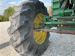 items/61fffb664d1bed11b5cf0003fff934d4/1984johndeere7720combine-8_24b518d1170a4691a1b8f516cf7f908e.jpg