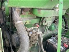 items/61fffb664d1bed11b5cf0003fff934d4/1984johndeere7720combine-8_3c27443e46db4b71b0bf0b880bacfe3c.jpg