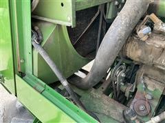 items/61fffb664d1bed11b5cf0003fff934d4/1984johndeere7720combine-8_44b4d96c5679493b868e83bd5d94e178.jpg