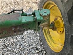 items/61fffb664d1bed11b5cf0003fff934d4/1984johndeere7720combine-8_7add0847ce1b485d85864c756e5bdf86.jpg