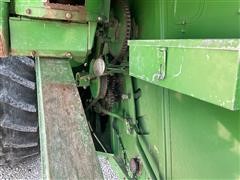 items/61fffb664d1bed11b5cf0003fff934d4/1984johndeere7720combine-8_9240ce8596a54249bde83c331ffe6207.jpg