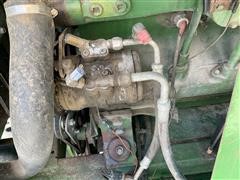 items/61fffb664d1bed11b5cf0003fff934d4/1984johndeere7720combine-8_a1fe2b8df573434691e4a150717beed6.jpg