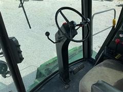 items/61fffb664d1bed11b5cf0003fff934d4/1984johndeere7720combine-8_a54962baacaf4dd397be33dd123dd9e9.jpg