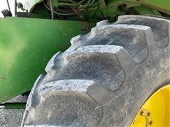 items/61fffb664d1bed11b5cf0003fff934d4/1984johndeere7720combine-8_bb1240fdd5af42039b61d15a90a1eefe.jpg